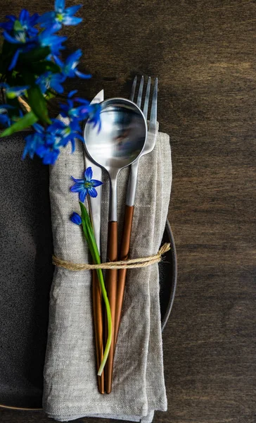 Spring table setting with blue scilla siberica — Stock Photo, Image