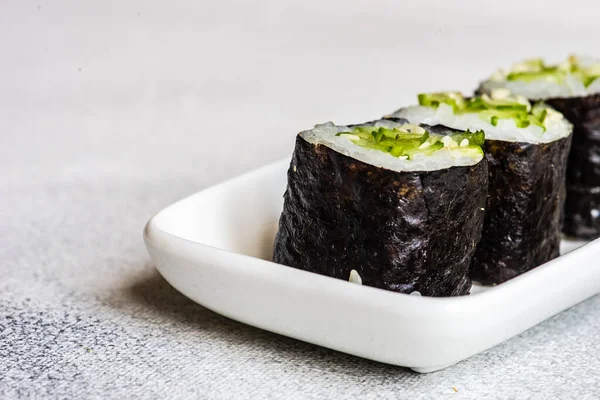 Sushi Set Kappa Maki Sloužil Kamenném Stole Hůlkami — Stock fotografie