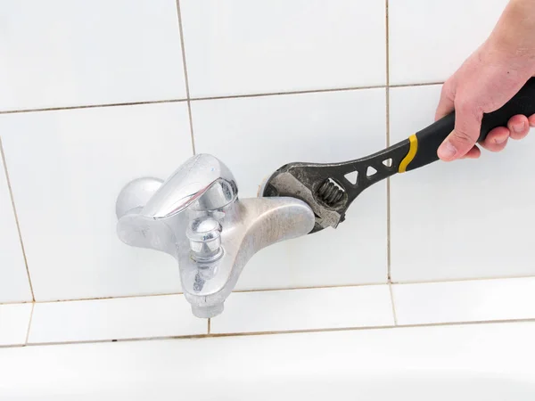 Plumber Uninstalling Water Faucet Bathroom — Stock Photo, Image