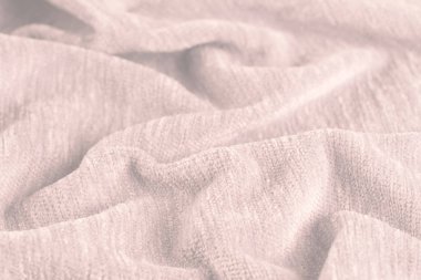 Buruşuk kumaş arka plan ve doku. Soyut arkaplan, boş şablon. Seçici odak.