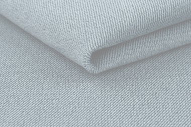 Buruşuk kumaş arka plan ve doku. Soyut arkaplan, boş şablon. Seçici odak.