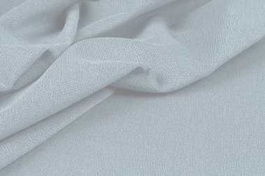 Buruşuk kumaş arka plan ve doku. Soyut arkaplan, boş şablon. Seçici odak.