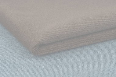 Buruşuk kumaş arka plan ve doku. Soyut arkaplan, boş şablon. Seçici odak.