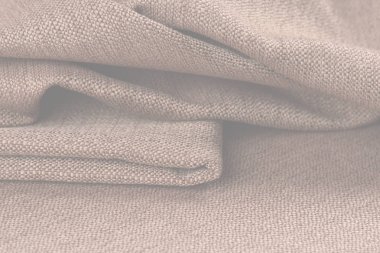 Buruşuk kumaş arka plan ve doku. Soyut arkaplan, boş şablon. Seçici odak.