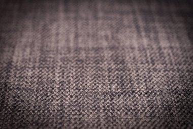 Gri kumaş dokusu. Arka plan boş şablon. Seçici odak.