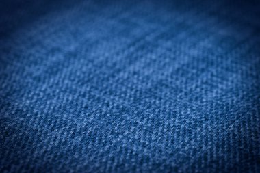 Mavi kumaş dokusu. Arka plan boş şablon. Seçici odak.