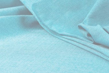 Buruşuk kumaş arka plan ve doku. Soyut arkaplan, boş şablon. Seçici odak.