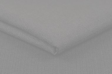 Buruşuk kumaş arka plan ve doku. Soyut arkaplan, boş şablon. Seçici odak.