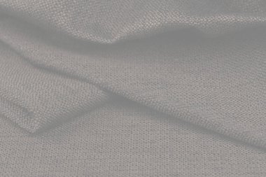 Buruşuk kumaş arka plan ve doku. Soyut arkaplan, boş şablon. Seçici odak.