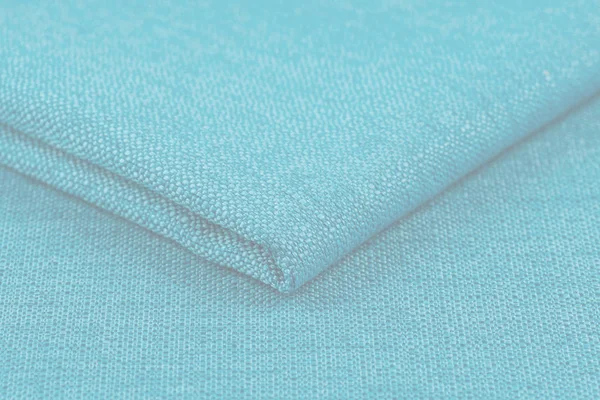 Buruşuk kumaş arka plan ve doku. Soyut arkaplan, boş şablon. Seçici odak.