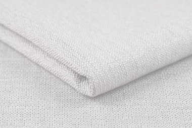 Buruşuk kumaş arka plan ve doku. Soyut arkaplan, boş şablon. Seçici odak.