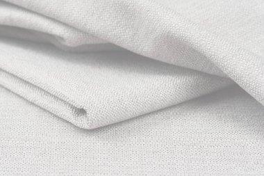 Buruşuk kumaş arka plan ve doku. Soyut arkaplan, boş şablon. Seçici odak.