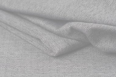 Buruşuk kumaş arka plan ve doku. Soyut arkaplan, boş şablon. Seçici odak.