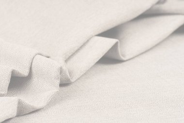 Buruşuk kumaş arka plan ve doku. Soyut arkaplan, boş şablon. Seçici odak.