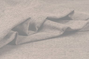 Buruşuk kumaş arka plan ve doku. Soyut arkaplan, boş şablon. Seçici odak.