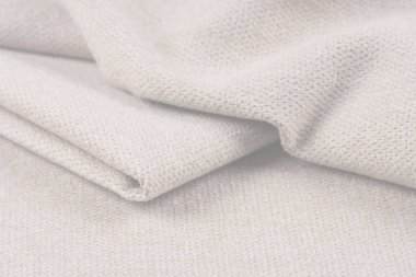 Buruşuk kumaş arka plan ve doku. Soyut arkaplan, boş şablon. Seçici odak.