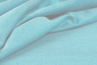 Buruşuk kumaş arka plan ve doku. Soyut arkaplan, boş şablon. Seçici odak.