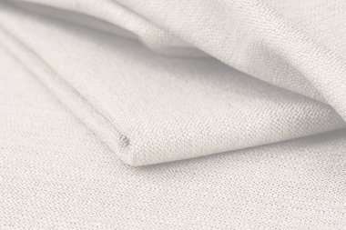 Buruşuk kumaş arka plan ve doku. Soyut arkaplan, boş şablon. Seçici odak.