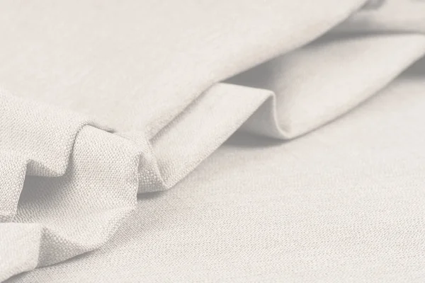 Buruşuk kumaş arka plan ve doku. Soyut arkaplan, boş şablon. Seçici odak.