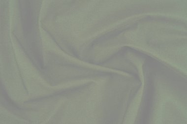 Tekstil ve doku konsepti. Buruşuk kumaş arkaplanının kapağı. Soyut arkaplan, boş şablon. Üst görünüm.