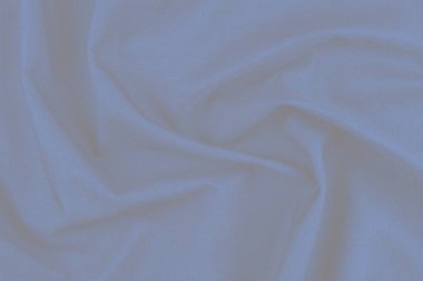 Tekstil ve doku konsepti. Buruşuk kumaş arkaplanının kapağı. Soyut arkaplan, boş şablon. Üst görünüm.