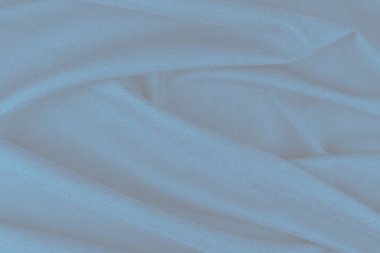 Tekstil ve doku konsepti. Buruşuk kumaş arkaplanının kapağı. Soyut arkaplan, boş şablon. Üst görünüm.