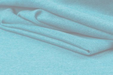 Buruşuk kumaş arka plan ve doku. Soyut arkaplan, boş şablon. Seçici odak.