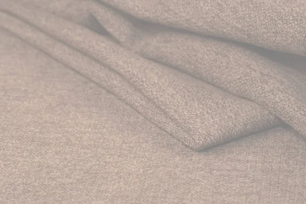 Buruşuk kumaş arka plan ve doku. Soyut arkaplan, boş şablon. Seçici odak.