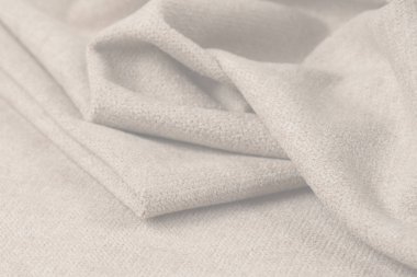 Buruşuk kumaş arka plan ve doku. Soyut arkaplan, boş şablon. Seçici odak.