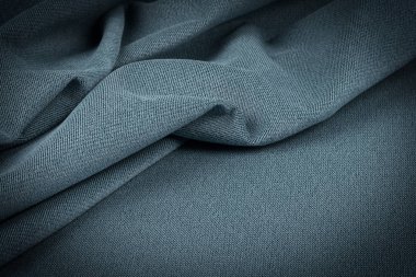 Buruşuk kumaş arka plan ve doku. Soyut arkaplan, boş şablon. Seçici odak.