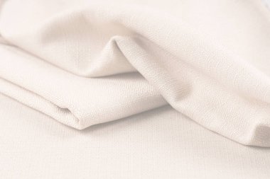 Buruşuk kumaş arka plan ve doku. Soyut arkaplan, boş şablon. Seçici odak.