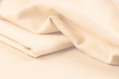 Buruşuk kumaş arka plan ve doku. Soyut arkaplan, boş şablon. Seçici odak.