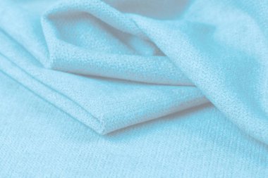 Buruşuk kumaş arka plan ve doku. Soyut arkaplan, boş şablon. Seçici odak.