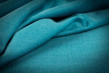 Buruşuk kumaş arka plan ve doku. Soyut arkaplan, boş şablon. Seçici odak.