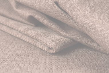 Buruşuk kumaş arka plan ve doku. Soyut arkaplan, boş şablon. Seçici odak.