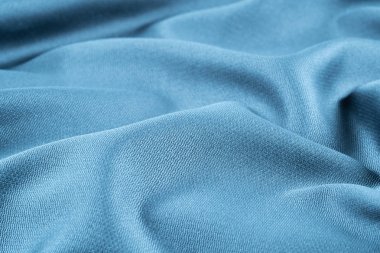 Buruşuk kumaş arka plan ve doku. Soyut arkaplan, boş şablon. Seçici odak.