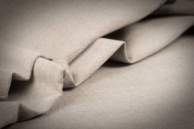 Buruşuk kumaş arka plan ve doku. Soyut arkaplan, boş şablon. Seçici odak.