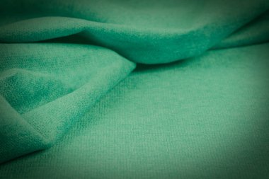 Buruşuk kumaş arka plan ve doku. Soyut arkaplan, boş şablon. Seçici odak.