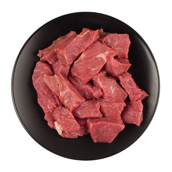 Carne Crua Corta Partes Uma Chapa Preta Isolado Fundo Branco — Fotografia de Stock