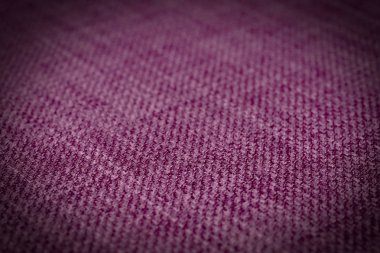 Kırmızı kumaş dokusu. Arka plan boş şablon. Seçici odak.