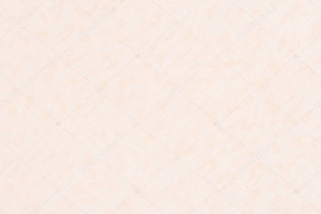 close up of a woolen fabric of beige color. Abstract background, empty template. Top view.