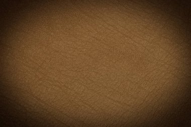Hafif kahverengi deri doku yüzey. Doğal tahıl inek deri hafif kahverengi deri doku yüzeyine yakın çekim. Arka plan