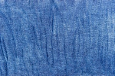 Mavi jeans kot kat arka plan doku kapatın. Üstten Görünüm.