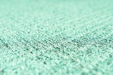 Yeşil kumaş dokusu. Arka plan boş şablon. Seçici odak.