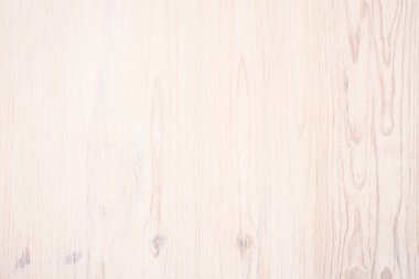 Arka plan olarak beyaz yumuşak ahşap yüzey. Arka plan, boş şablon.