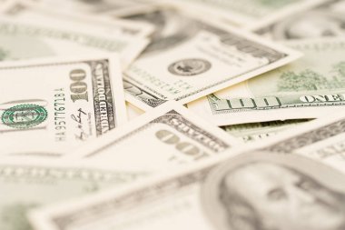 Dolar arka plan, yüz ABD Doları banknot faturaları, birçok Amerikan nakit para, seçici odak