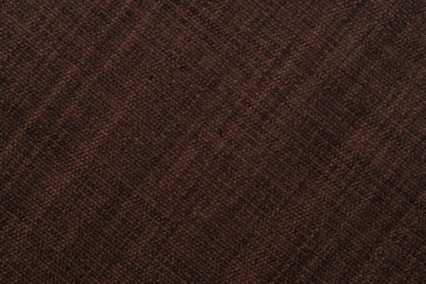 Old brown cloth texture. Abstract background, empty template. Top view.