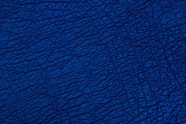 Fondo de cuero texturizado azul oscuro . — Foto de Stock