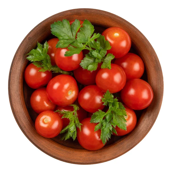 Pomidory z pietruszki w ceramiczna miska na białym tle na białym tle. — Zdjęcie stockowe
