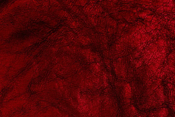 Темно-красная кожаная поверхность в качестве фона, текстура кожи . — стоковое фото